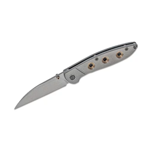 WE KNIFE GOLDEN ANDONIZED HOLES GREY- 908A